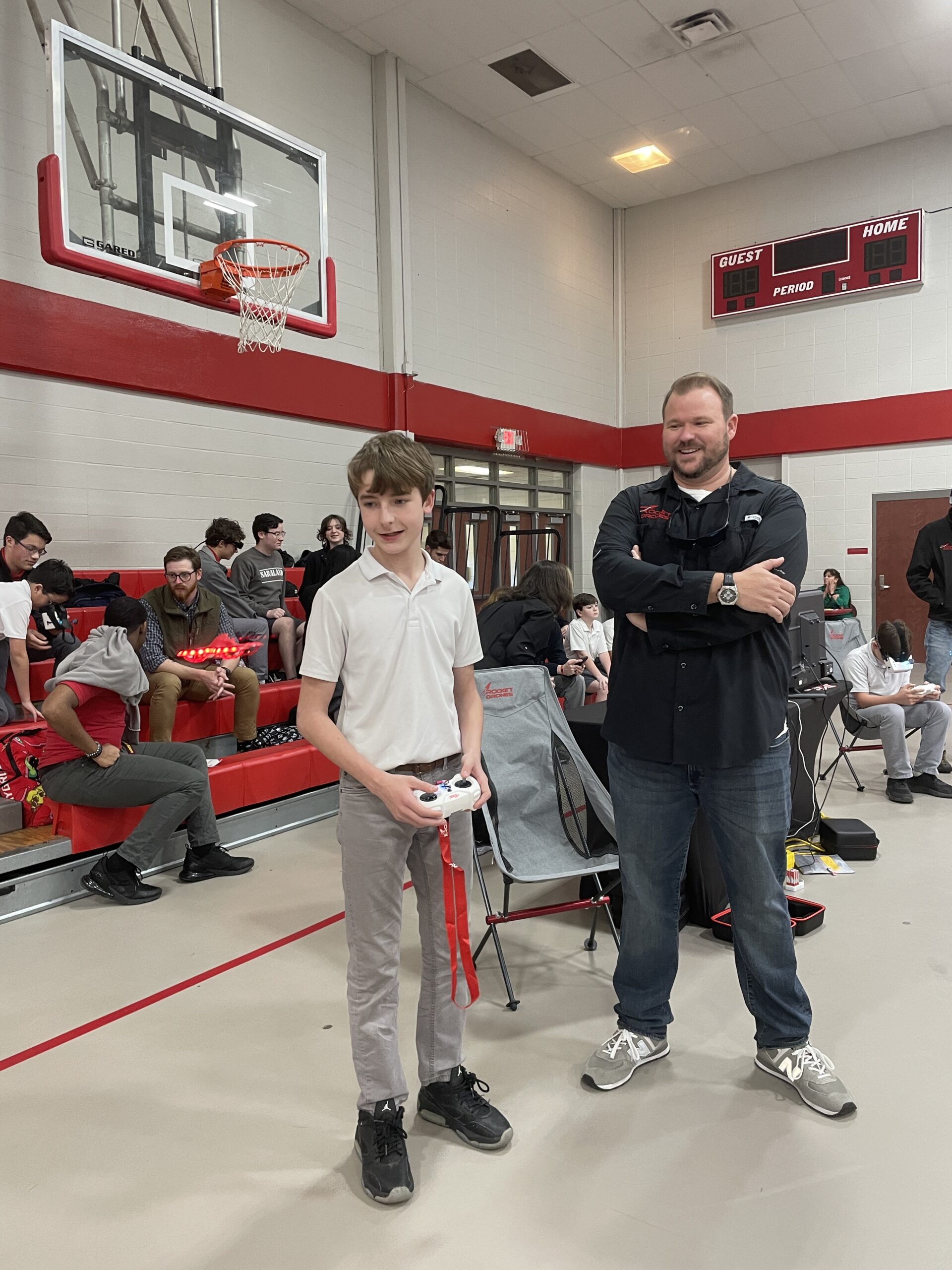 rocketdrones-fpv-drone-student Rocket Drones founder with student pilot during STEM drone curriculum demonstration