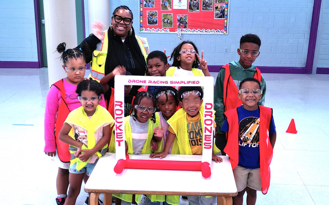 Group of students and instructor at a Rocket Drones educational event in Washington D.C.