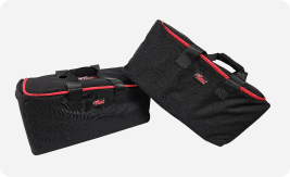 Set of Rocket Drones black carrying bags with red trim used for transporting classroom drone kits and accessories.